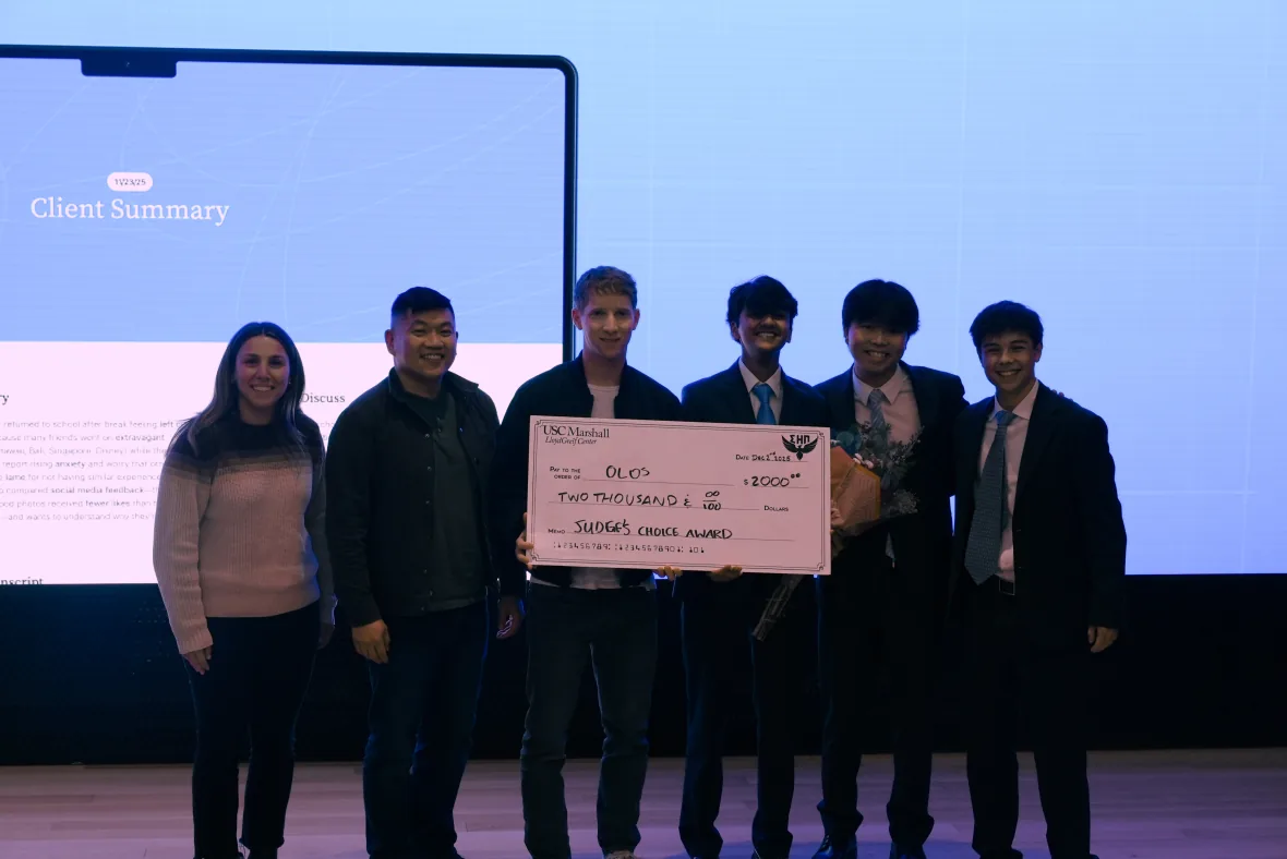 The Olos team on stage with the Judges’ Choice award at USC Marshall.